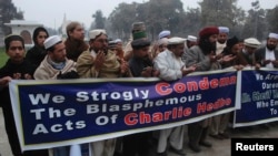 Траурная акция в Пакистане, в память исламистов-"шахидов", убитых в Париже во время терактов в начале января. Пешавар, 11 января