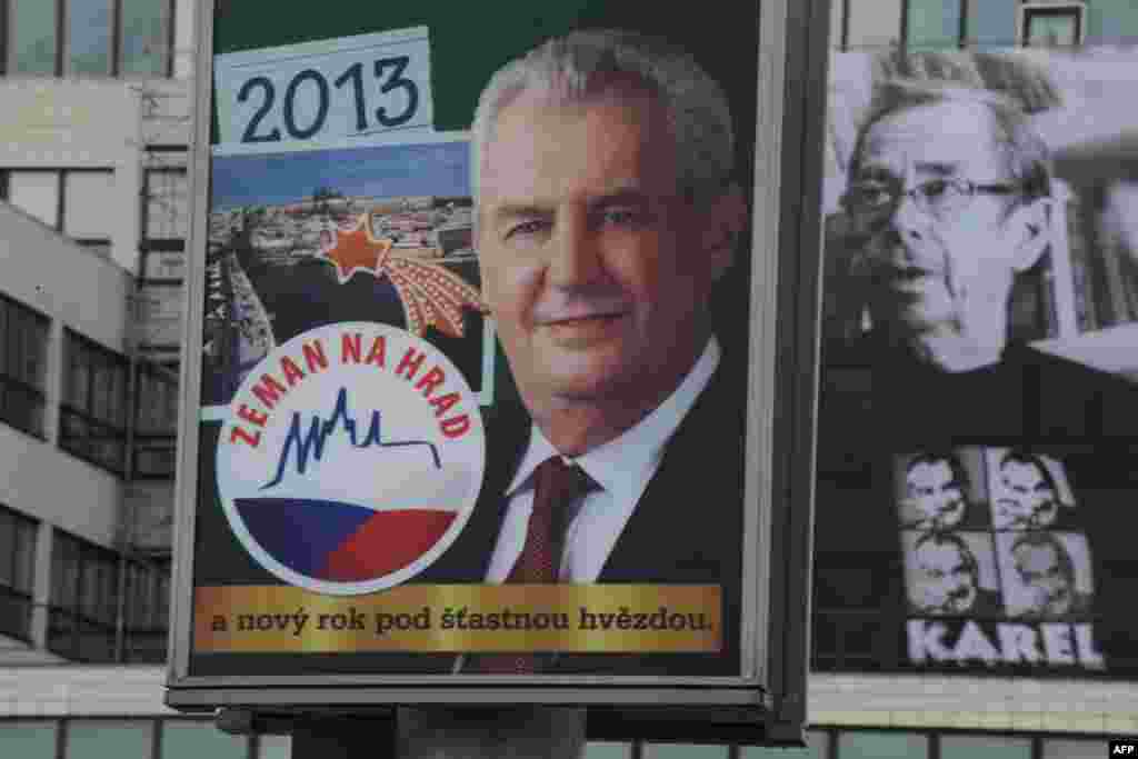 A billboard features presidential candidate Milos Zeman (left); beside it is a photograph of former Czech President Vaclav Havel wearing a T-shirt showing presidential candidate and Foreign Minister Karel Schwarzenberg.