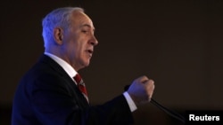 Prime Minister Benjamin Netanyahu says sanctions against Iran should include the threat of military action.