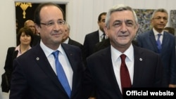 Встреча президента Армении Сержа Саргсяна (справа) с президентом Франции Франсуа Оландом в Вильнюсе, 29 ноября 2013 г. (Фотография - пресс-служба президента Армении)