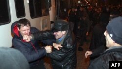 Pro-Russian supporters clash with pro-Ukrainian activists during a rally in the eastern Ukrainian city of Donetsk on March 13.