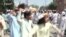 Protesters Dance Through Streets Of Peshawar