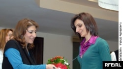 Karine Simonian receives her award in Yerevan