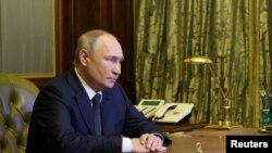 Vlagyimir Putyin az orosz Biztonsági Tanács szentpétervári ülésén 2022. október 10-én
