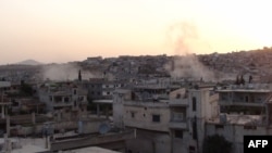 Syria -- Shelling on Rastan, near the central rebel hotbed of Homs, 18May2012