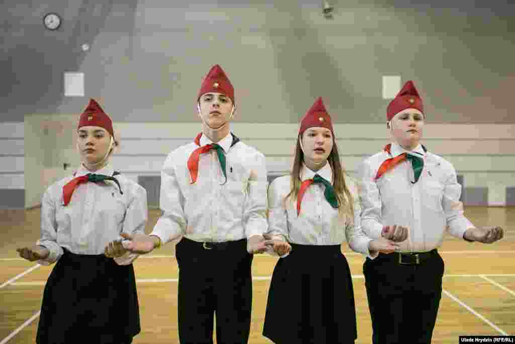 Young Pioneers pose during a parade in Minsk, Belarus, on February 8. More than 500 members of the youth group came from all over the country to take part in the parade at the Uruchcha Palace of Sports. (Uladz Hrydzin, RFE/RL)