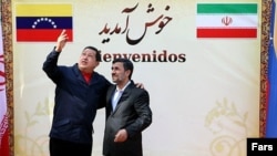 Venezuelan President Hugo Chavez (left) being welcomed at the presidential palace in Tehran by Iranian President Mahmud Ahmadinejad in 2010.