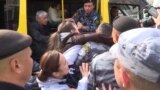 grab Dramatic Scenes As Kazakh Police Seize Teenager