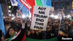 People rally outside the US Consulate in Milan, Italy, on January 13 in support of nationwide protests in Iran.