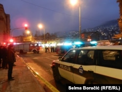 Pulled down scaffolding in the center of Sarajevo , several injured