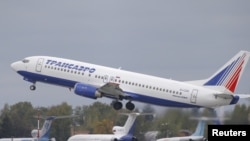 Russia -- A Transaero Boeing 737 aircraft takes off from a runway at Moscow's Vnukovo airport, Russia, October 2, 2015