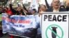 Amid heightened tensions with India, Pakistani civil society activists march in a peace rally in Lahore on February 28. 