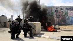 Рамалла қаласындағы қақтығыстан көрініс. 30 наурыз 2012 жыл. Көрнекі сурет