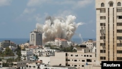 Գազայի հատված - Գազա քաղաքում Իսրայելի օդուժի հարվածներից հետո ծուխ է բարձրանում, 9-ը օգոստոսի, 2014թ․