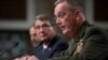 U.S. Secretary of Defense Ash Carter (left) and Joint Chiefs of Staff Chair General Joseph Dunford Jr. (right) testifying before Congress.