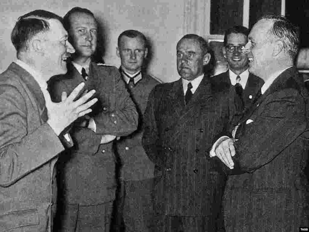 Adolf Hitler welcomes von Ribbentrop back to the Reich Chancellery in Berlin after the signing of the pact. - One week after the agreement was signed, on September 1, 1939, German forces attacked Poland, marking the start of the Second World War. 