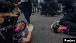 Momente gjatë arrestimit të disa protestuesve anti-qeveritar në Hong Kong. Foto nga arkivi. 