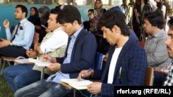 Afghan journalists attend a press conference in Kabul in May.