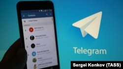 Russia -- Telegram, a free cloud-based instant messaging service, running on a smartphone