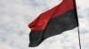 У Кам’янському депутати поштовхалися через червоно-чорний прапор