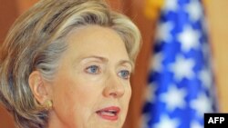 U.S. Secretary of State Hillary Clinton was criticized for saying political considerations would come first on her China trip.