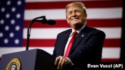 U.S. -- President Donald Trump speaks during a campaign rally at Florida State Fairgrounds Expo Hall in Tampa, July 31, 2018.