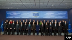 European Union leaders pose for group photo at EU headquarters in Brussels on March 14.