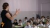 Armenia - A teacher holds a class at a school in Yerevan.