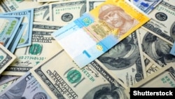 Національний банк України встановив опівдні довідкове значення курсу 25 гривень 24 копійки за долар