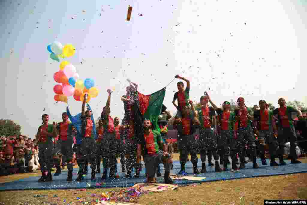 Afghan Army soldiers celebrate Soldiers Day in Jalalabad on February 27. (epa-EFE/Ghulamullah Habibi)