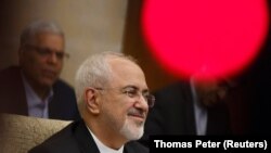 CHINA -- Iranian Foreign Minister Mohammad Javad Zarif holds talks with Chinese State Councillor and Foreign Minister Wang Yi (not pictured) at Diaoyutai state guesthouse in Beijing, China May 13, 2018.