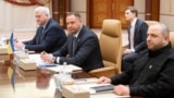 Ukrainian Foreign Minister Andriy Sybiha (left), the head of the Ukrainian Presidential Office Andriy Yermak (center), and Ukrainian Defense Minister Rustem Umerov attend a meeting with U.S. officials in Jeddah, Saudi Arabia, on March 11. 