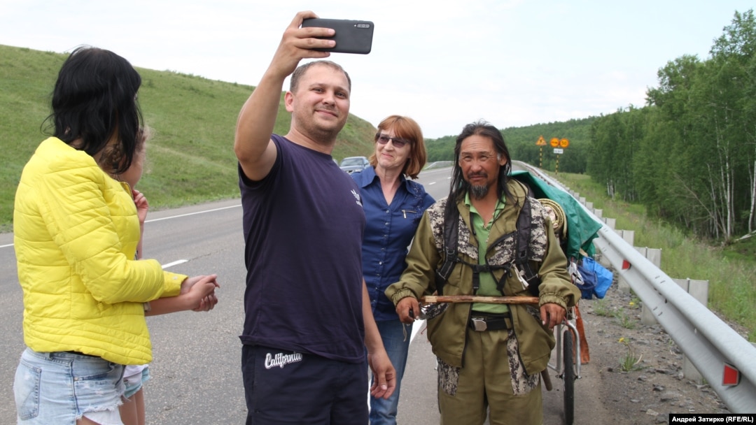 Aleksandr Gabyshev (with beard) attracted attention when he announced in 2019 that he would trek across Russia to exorcise Vladimir Putin from power.