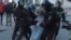 RUSSIA -- A Russian civil rights lawyer has offered a 100,000 ruble reward for help identifying a National Guardsman who punched a female protester.
