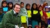 Author Greg Mortenson with Pakistani schoolchildren