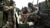 Nagorno-Karabakh -- Ethnic Armenian soldiers check cannon's shells in a trench at artillery positions near the Nagorno-Karabakh's town of Martuni, April 7, 2016