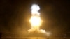 Photo released by US Central Command shows explosions at an unnamed location on July 11-12