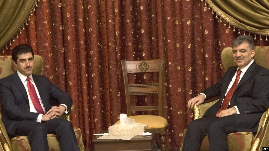 Nechirvan Barzani (left), the prime minister of the Kurdish Regional Government, meets with Turkish President Abdullah Gul in Baghdad on March 24.