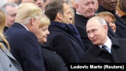 در این تصویر از سال ۲۰۱۸ رهبران روسیه، فرانسه، آلمان و آمریکا در گرامیداشت آتش‌بس ۱۱ نوامبر ۱۹۱۸ در پاریس