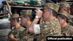 Armenia - Defense Minister Seyran Ohanian (second from left) inspects Armenian army positions on the border with Azerbaijan, 08Aug2012.