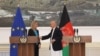 European Union foreign policy chief Federica Mogherini (left) shaking hands with the Afghan President Ashraf Ghani during a press conference at the presidential palace in Kabul on March 26.