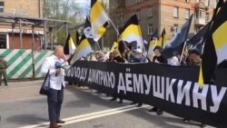 Организатор "Русских маршей" бежал из России