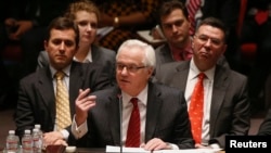 Russia's Ambassador to the UN Vitaly Churkin (center) called the UN vote a "moral victory" for Russia. (file photo)