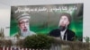 FILE: A banner with pictures of Gulbuddin Hekmatyar in Kabul.
