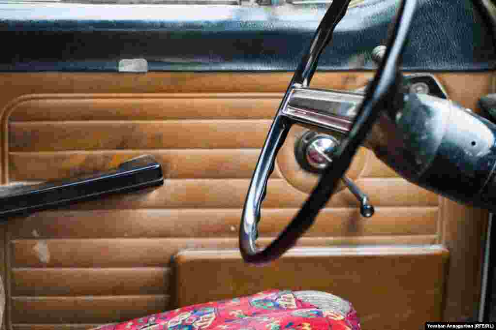 The interior of an old, Soviet-era Volga. Twenty-five years ago, owning a Volga was a matter of immense pride. Now they're considered shabby and second-rate, with most Turkmen preferring foreign-made cars.