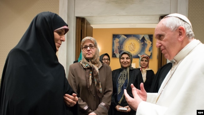 Pope Francis receives Iranian Vice President Shahindokht Molaverdi (L), in Vatican City, February 12, 2015