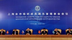 A signing ceremony during the Shanghai Cooperation Organization summit in the Great Hall of the People in Beijing on June 7, when the two-day gathering was concluding.