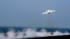 A F/A-18E Super Hornet takes off from the flight deck of the aircraft carrier USS Dwight D. Eisenhower on October 20, 2016 in the Gulf, October 21, 2016