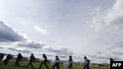 German soldiers take part in a KFOR military exercise in the village of Novo Selo, in northern Kosovo, in 2009.