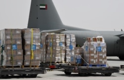 Tons of medical equipment and coronavirus testing kits provided by the World Health Organization being prepared for delivery to Iran with a U.A.E. military transport plane in Dubai in March